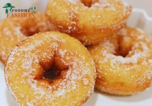 simple homemade doughnuts with powdered sugar”
